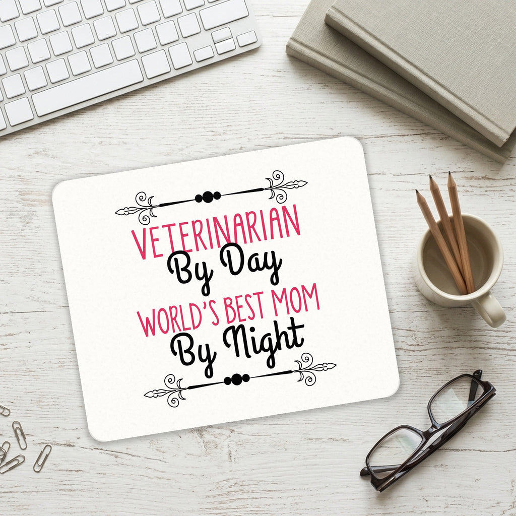 Vet By Day, Best Mom By Night mouse pad on a desk with a keyboard