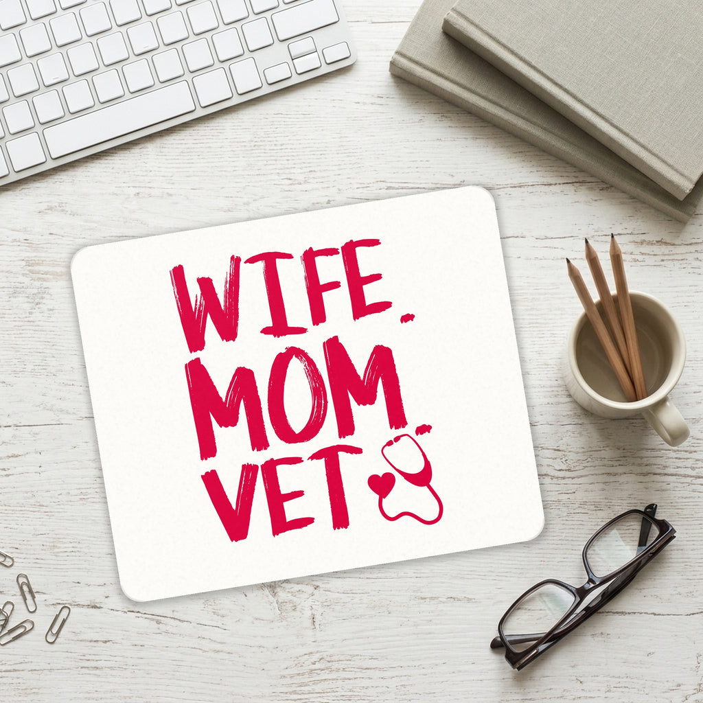 Wife. Mom. Vet. mouse pad on a desk with a keyboard