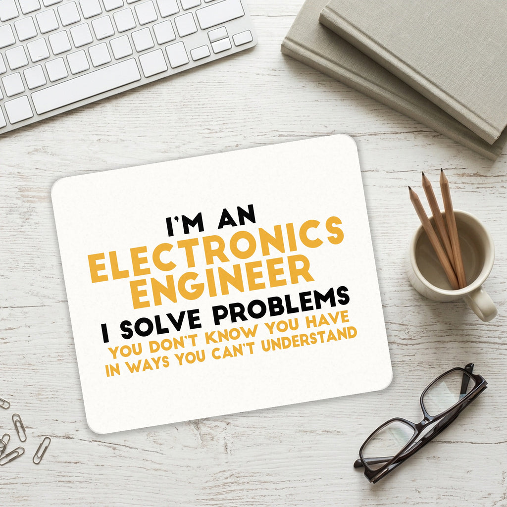 I'm an Electronics Engineer I Solve Problems mouse pad on a desk with a keyboard