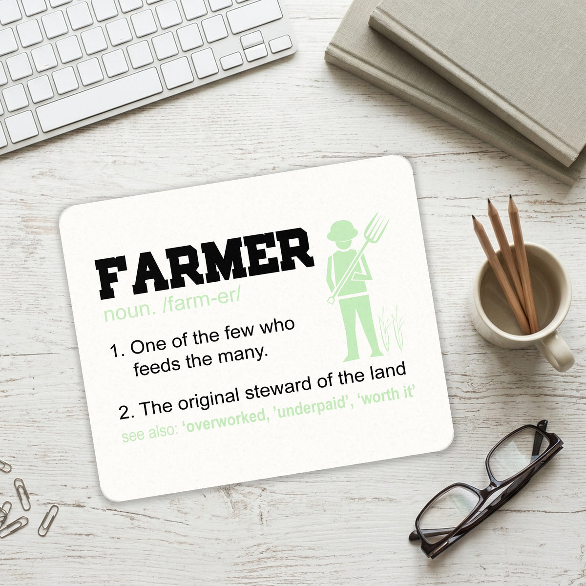 Farmer Definition - Few Who Feeds Many mouse pad on a desk with a keyboard
