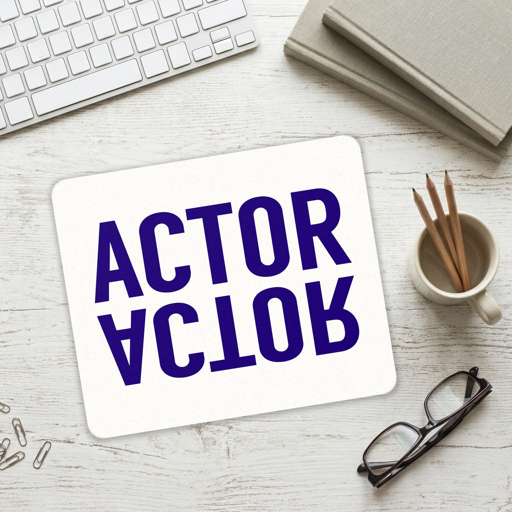 Actor (Reflection) mouse pad on a desk with a keyboard