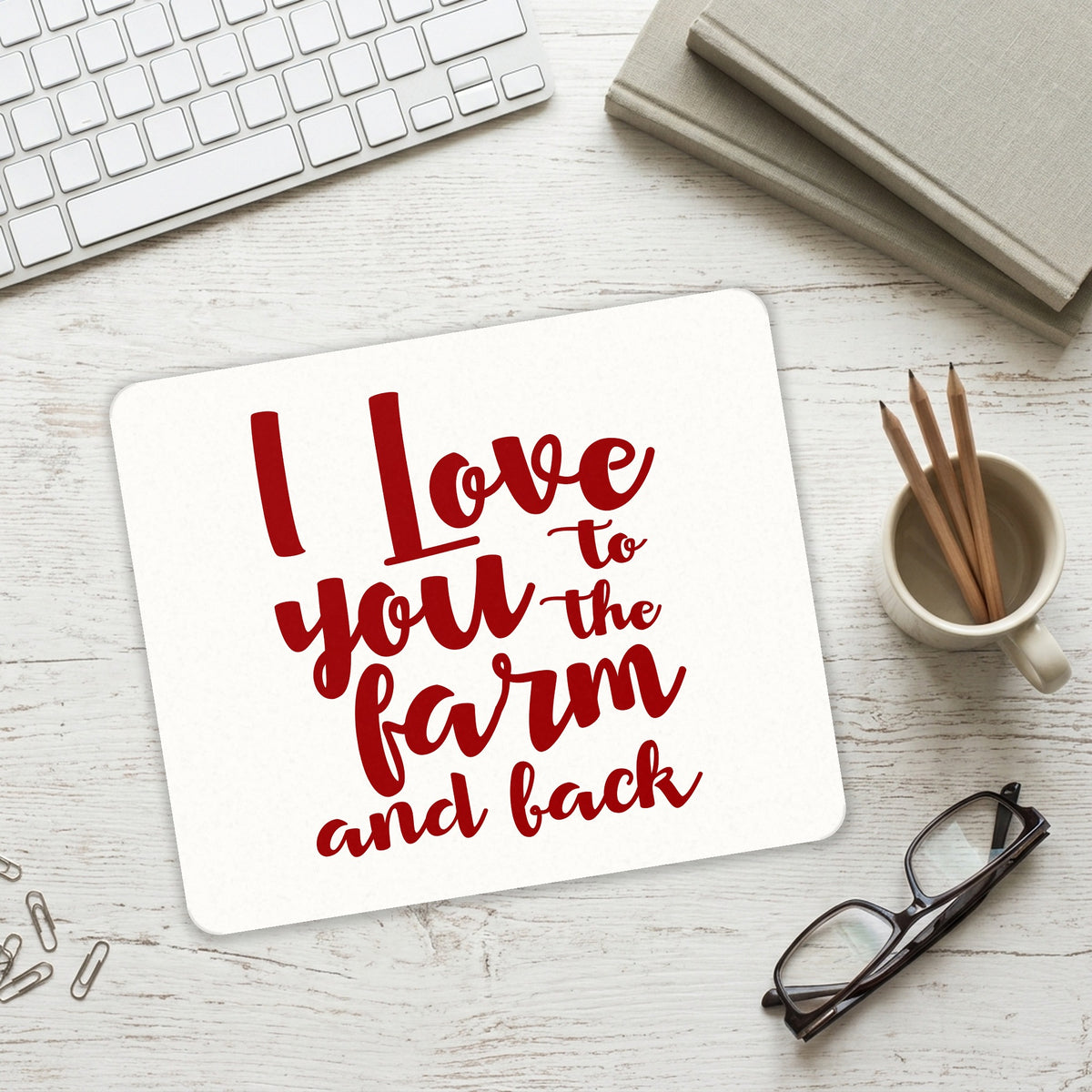 I Love You To The Farm And Back mouse pad on a desk with a keyboard