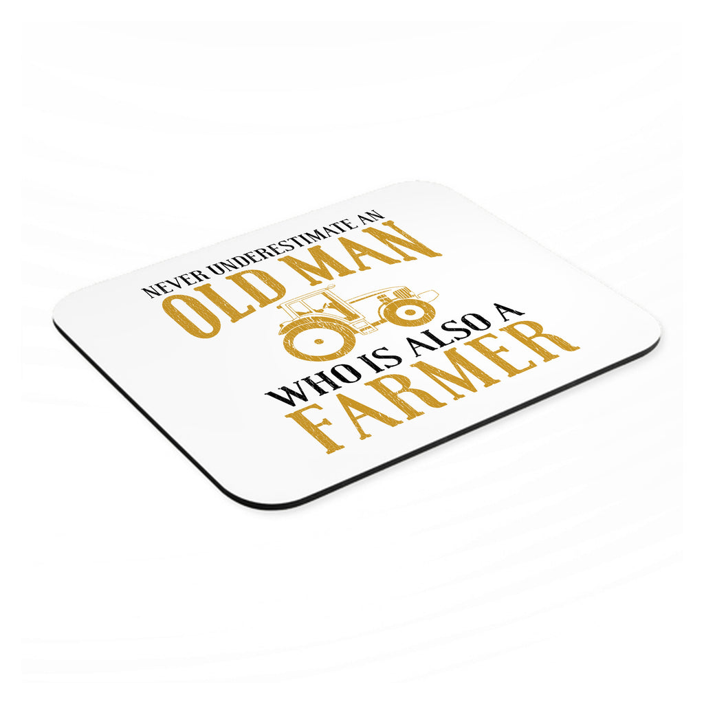 Never Underestimate Old Man Farmer mouse pad, angled view showing the 1/4 inch thick base