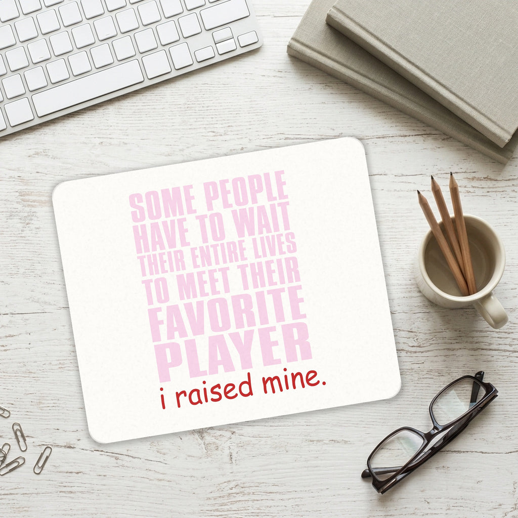 I Raised My Favorite Player mouse pad on a desk with a keyboard