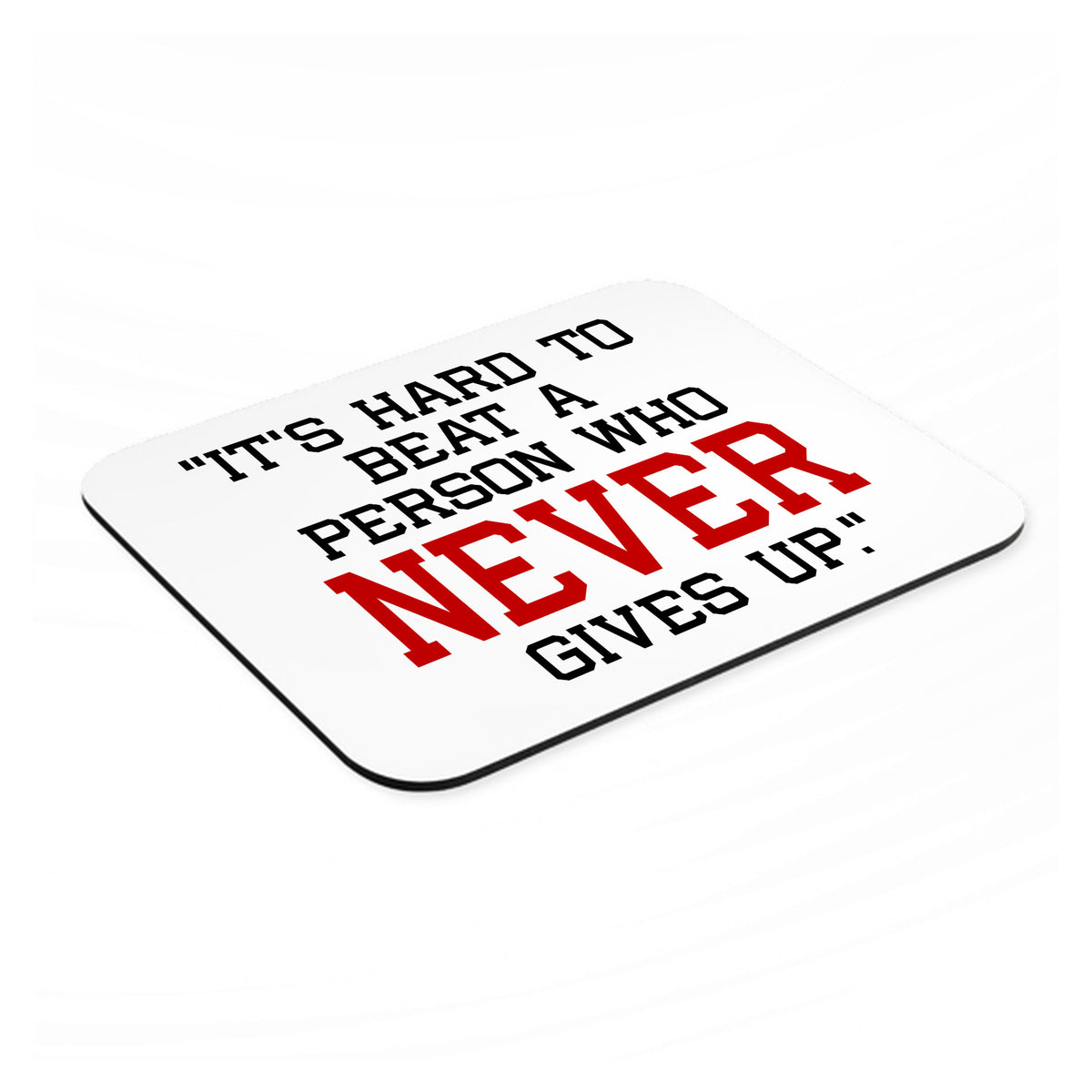 It's Hard to Beat a Person Who Never Gives Up mouse pad, angled view showing the 1/4 inch thick base