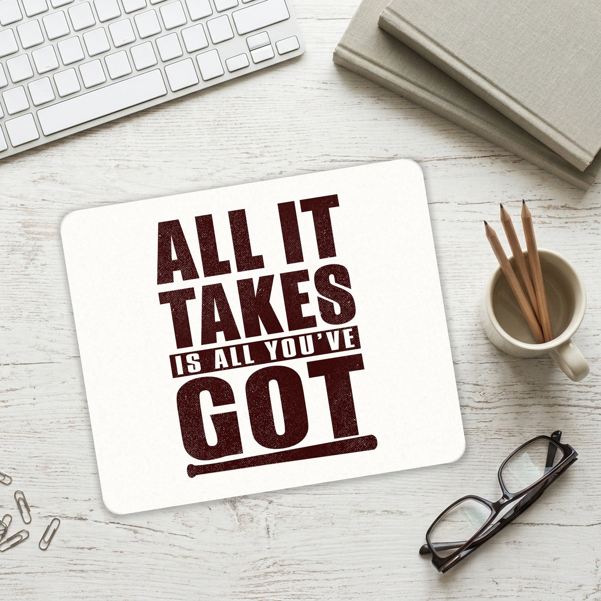 All It Takes Is All You've Got Baseball mouse pad on a desk with a keyboard