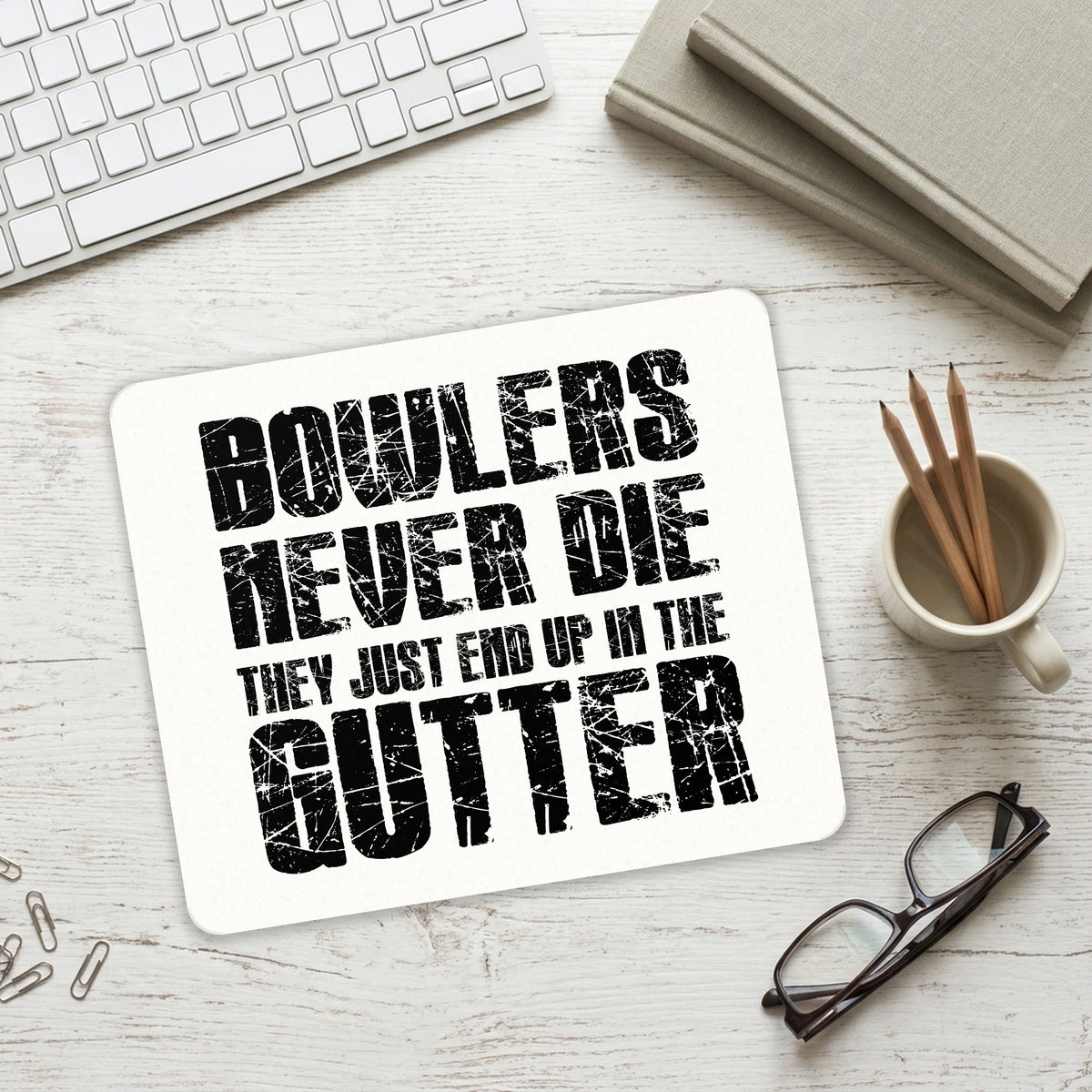Bowlers Never Die They End Up In The Gutter mouse pad on a desk with a keyboard