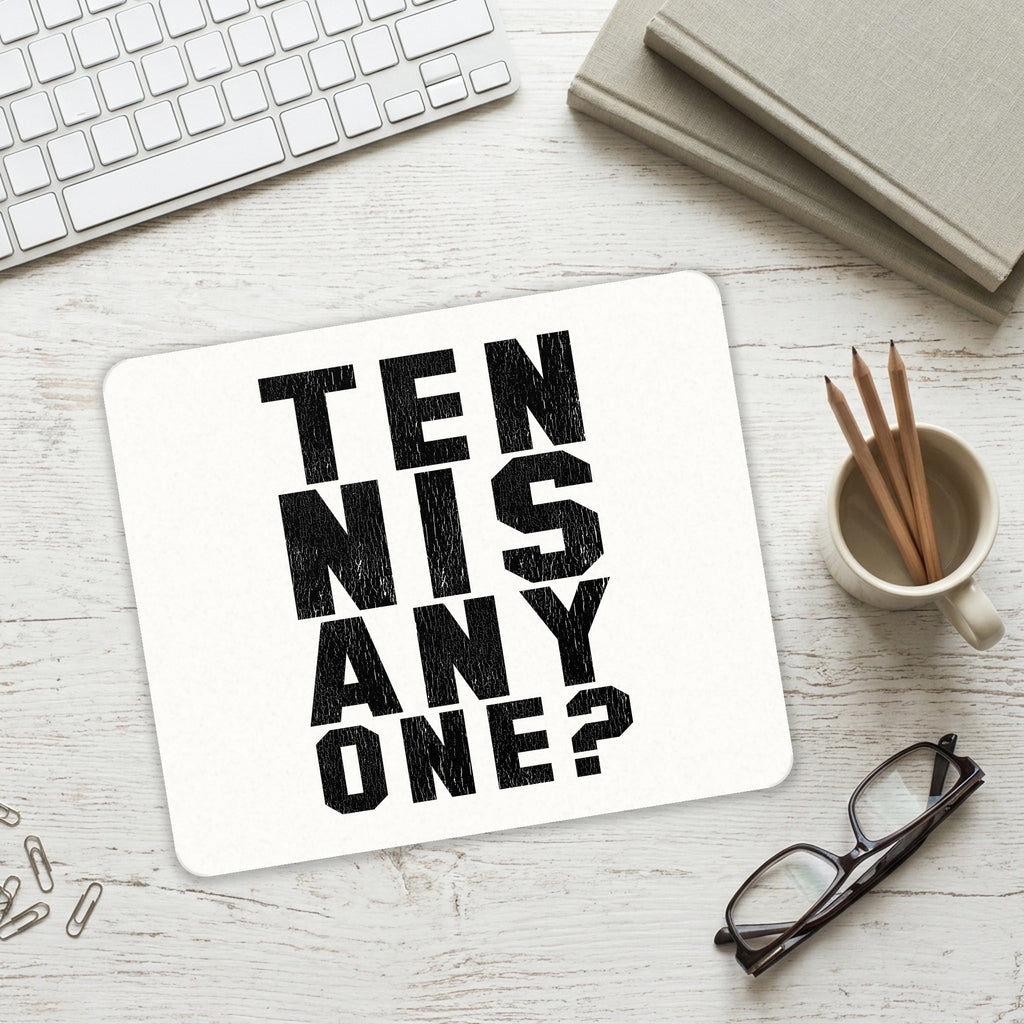 Tennis Anyone? mouse pad on a desk with a keyboard