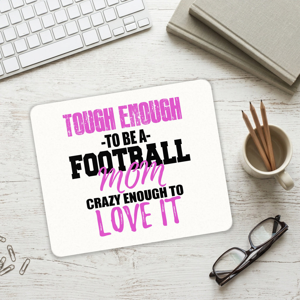 Tough Enough to be a Football Mom Love It mouse pad on a desk with a keyboard