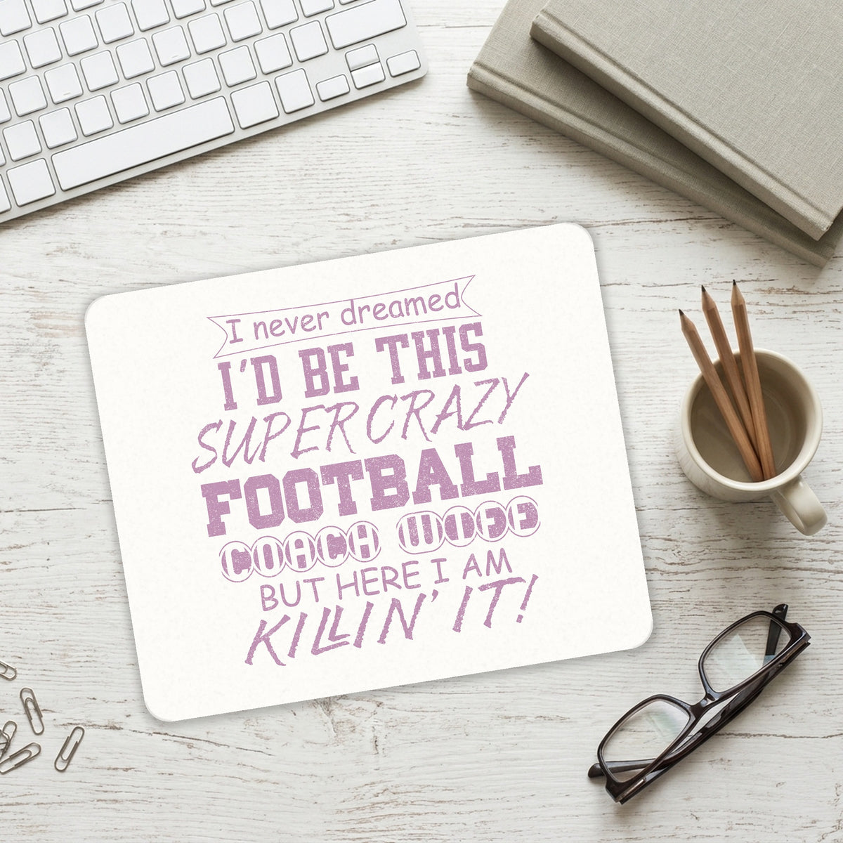 Super Crazy Football Coach Wife Killin' It mouse pad on a desk with a keyboard