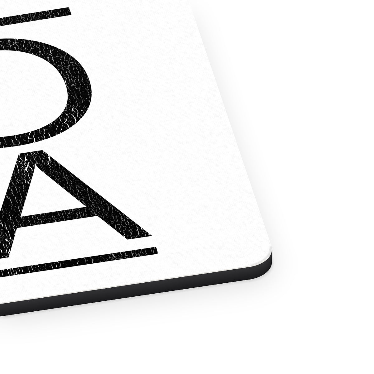 Yoga Black Word Art mouse pad, close-up of the fabric surface and rubber edge