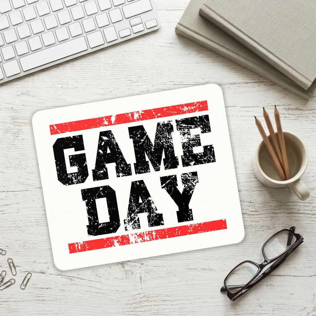 Game Day mouse pad on a desk with a keyboard