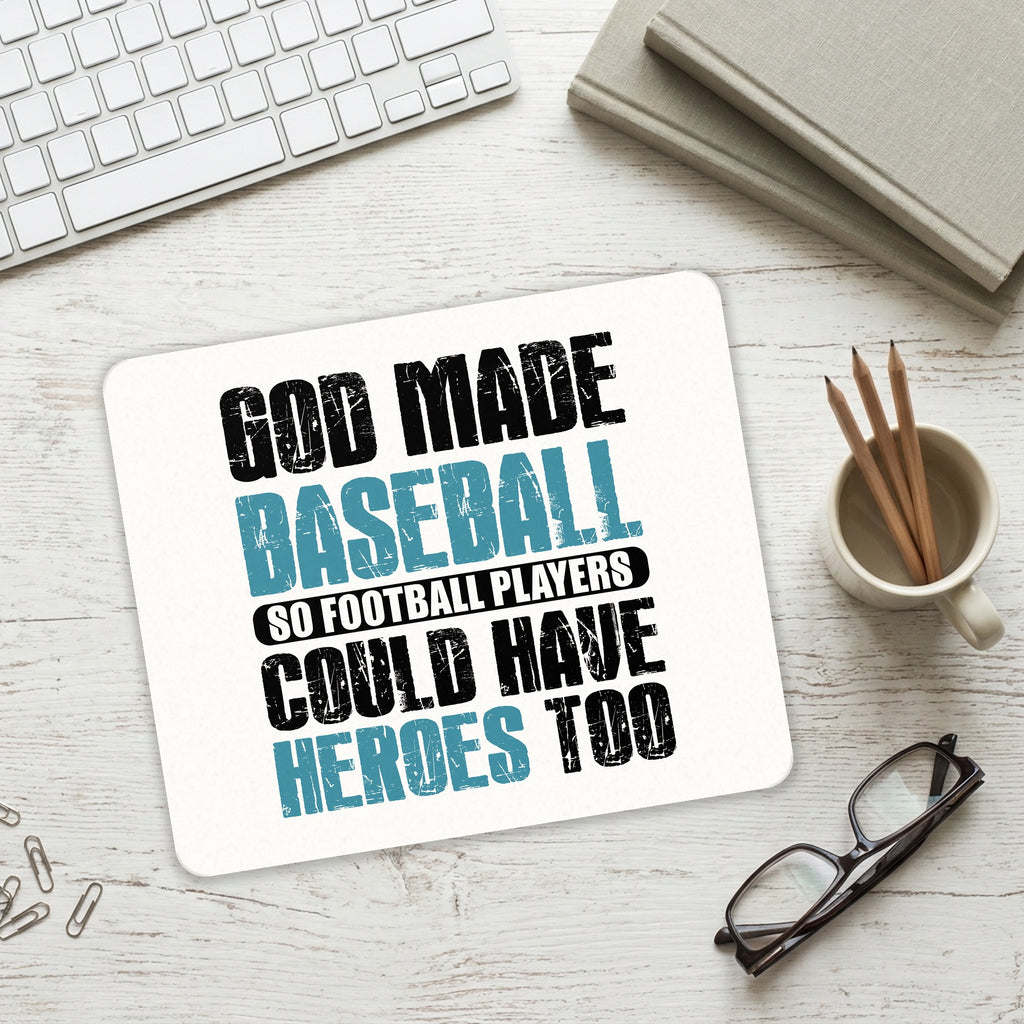 God Made Baseball so Football Players Heroes mouse pad on a desk with a keyboard