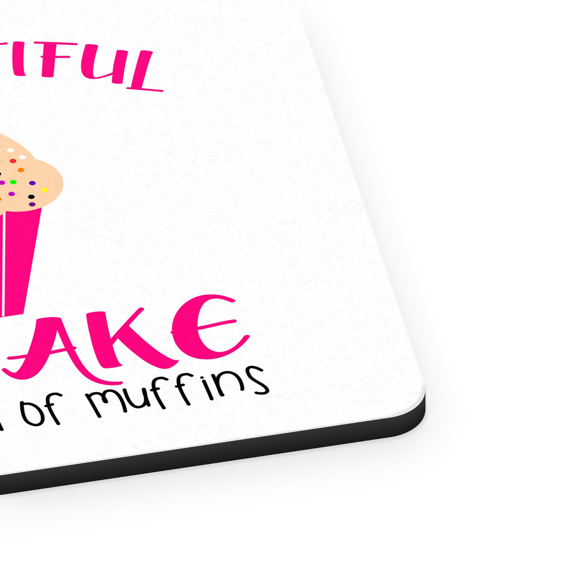 Be a Beautiful Cupcake in a World of Muffins mouse pad, close-up of the fabric surface and rubber edge