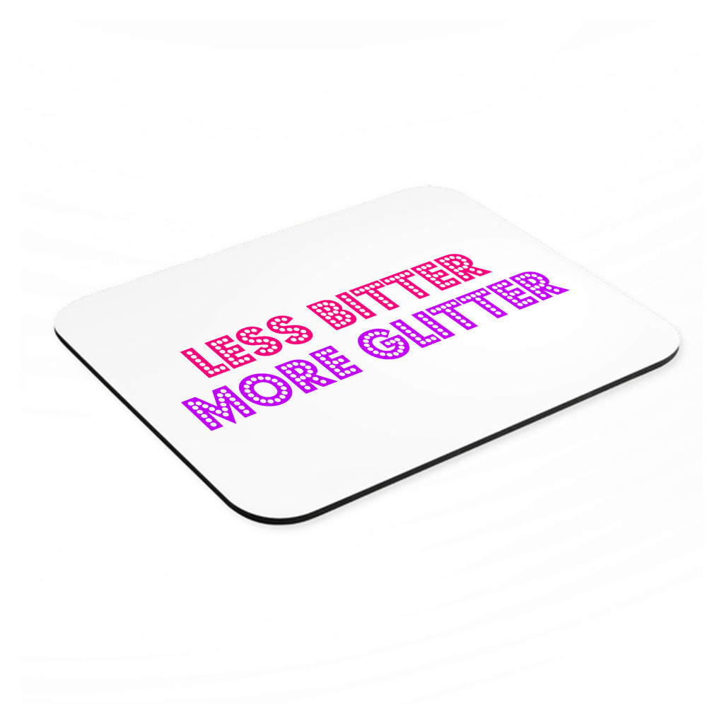 Less Bitter More Glitter mouse pad, angled view showing the 1/4 inch thick base