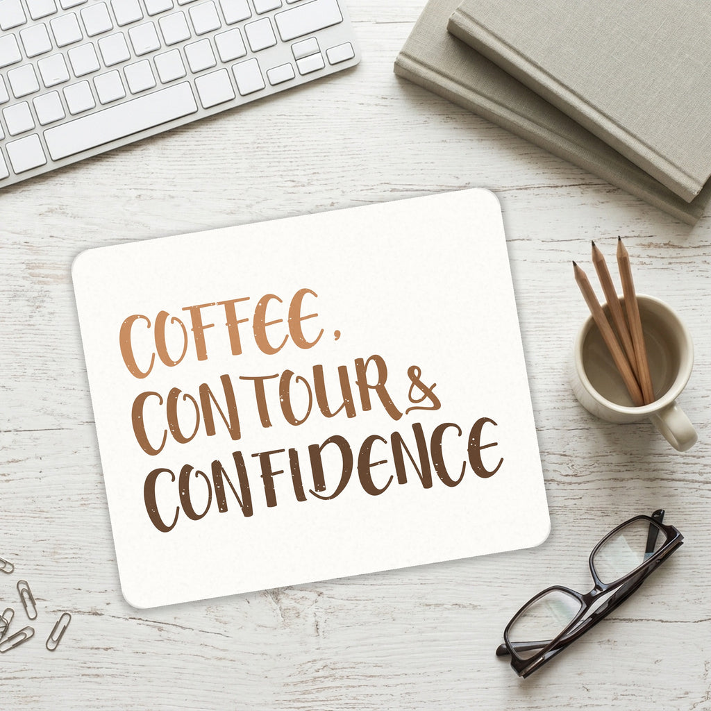 Coffee Contour & Confidence mouse pad on a desk with a keyboard
