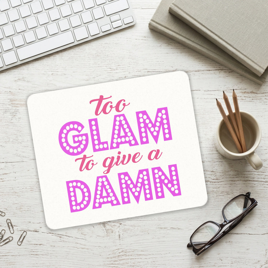 Too Glam to Give a Damn mouse pad on a desk with a keyboard