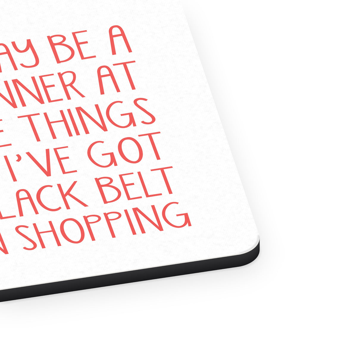 Beginner at Some Things Black Belt in Shopping mouse pad, close-up of the fabric surface and rubber edge