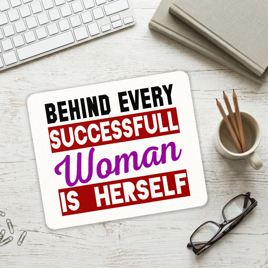 Behind Every Successful Woman is Herself mouse pad on a desk with a keyboard