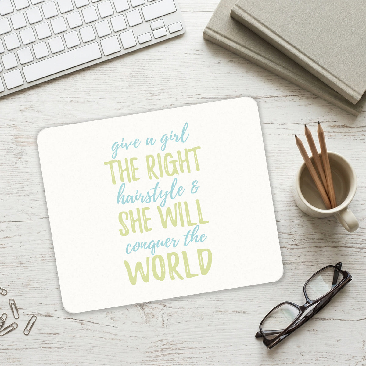 Girls With Right Hairstyle Will Conquer the World mouse pad on a desk with a keyboard