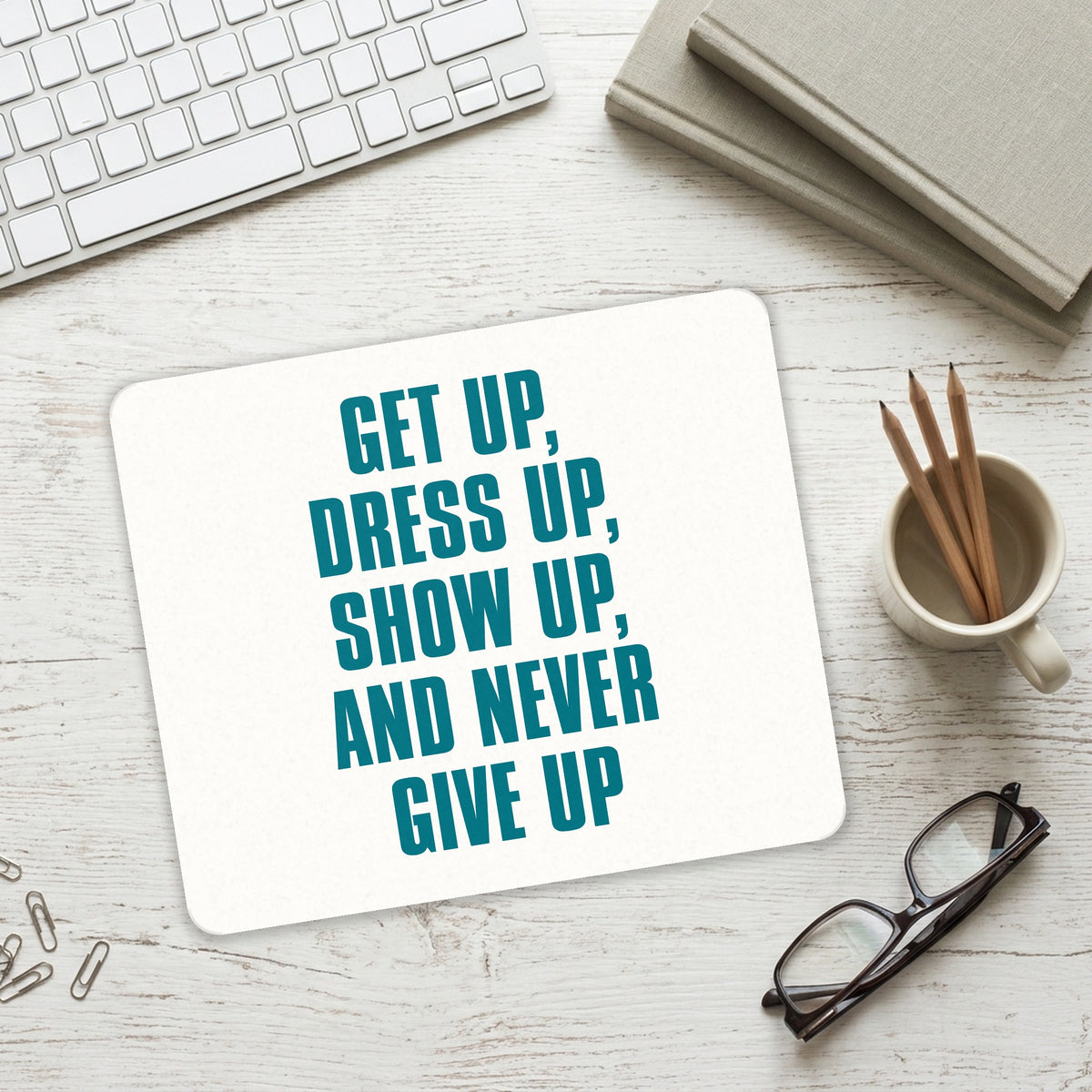 Get Up Dress Up Show Up Never Give Up mouse pad on a desk with a keyboard