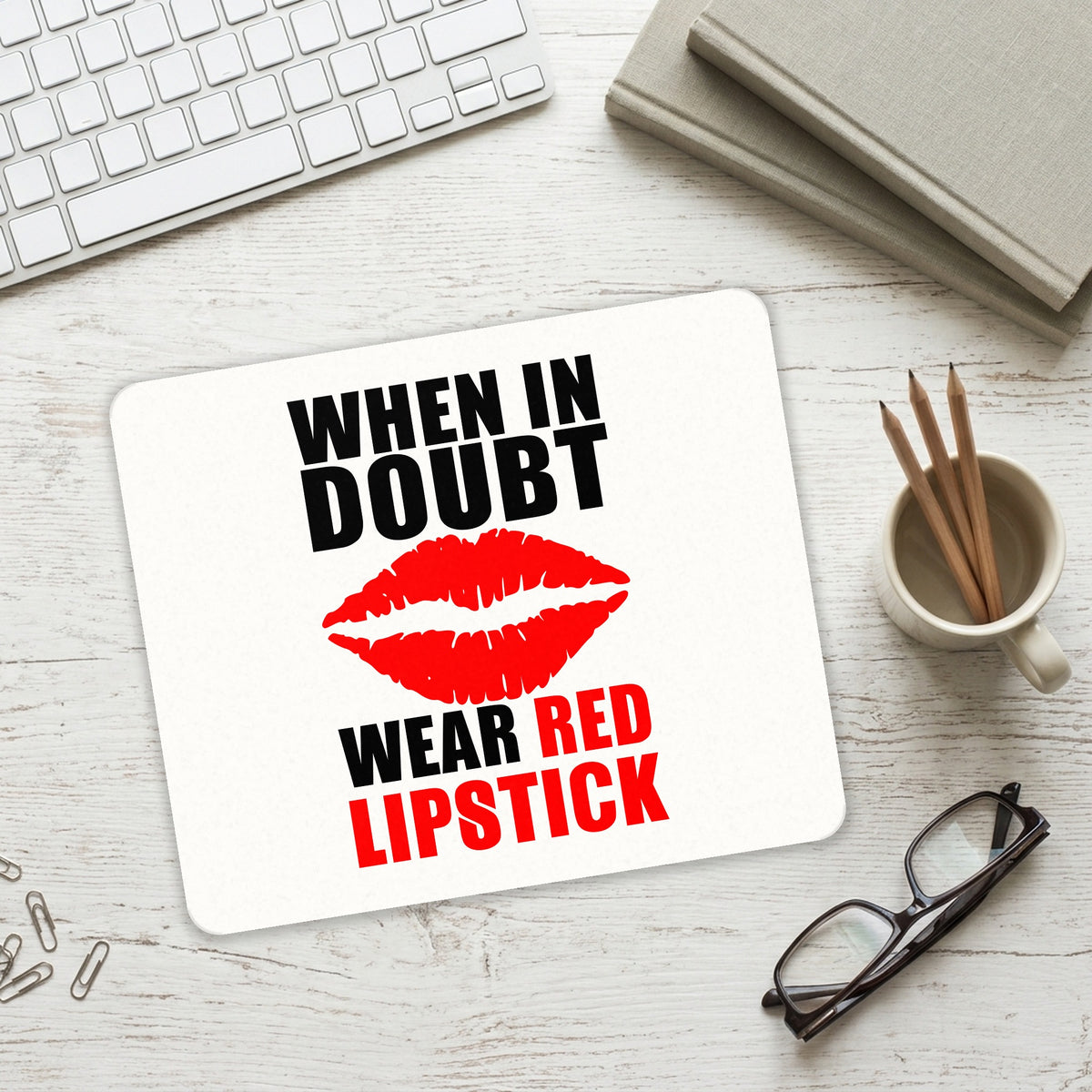When in Doubt Where Red Lipstick mouse pad on a desk with a keyboard
