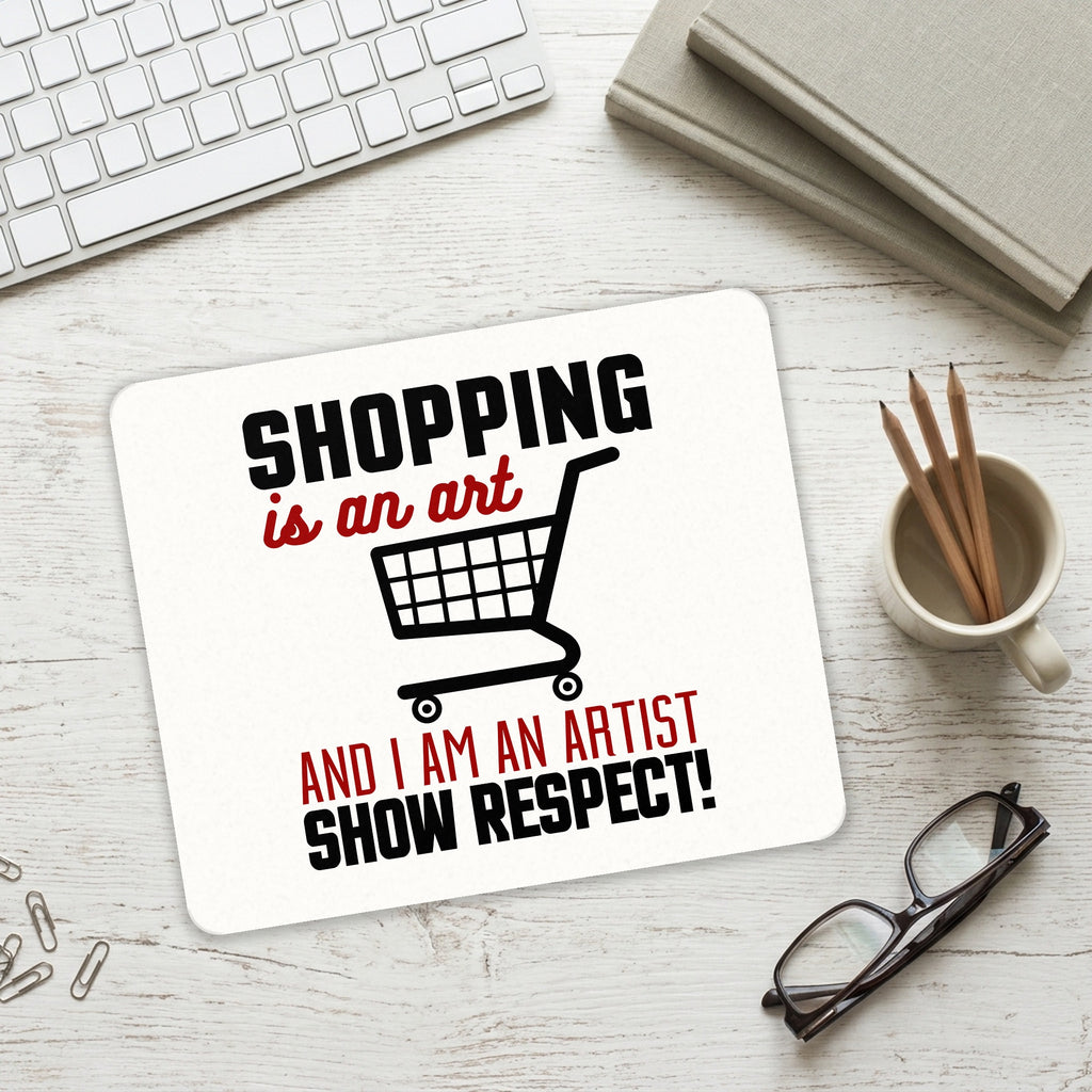 Shopping is an Art I'm an Artist Respect mouse pad on a desk with a keyboard