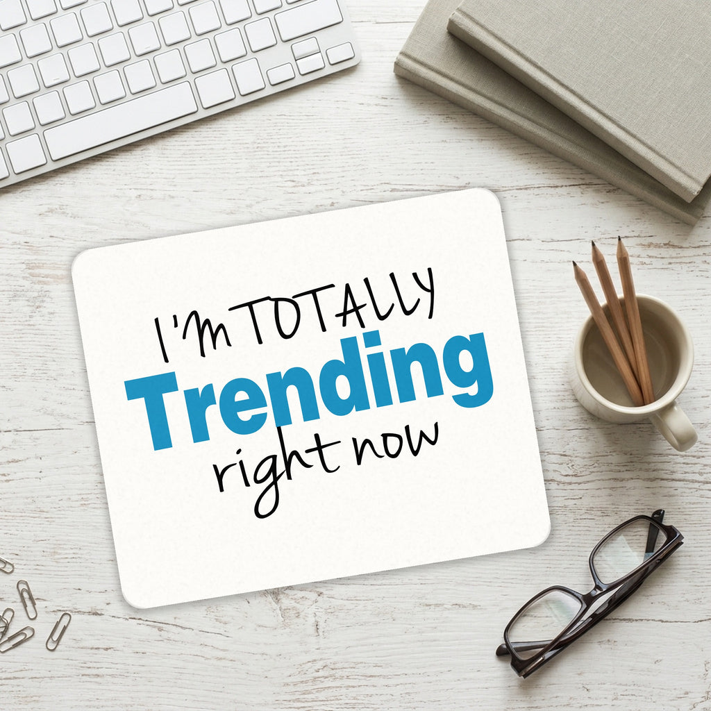 I'm Totally Trending Right Now mouse pad on a desk with a keyboard