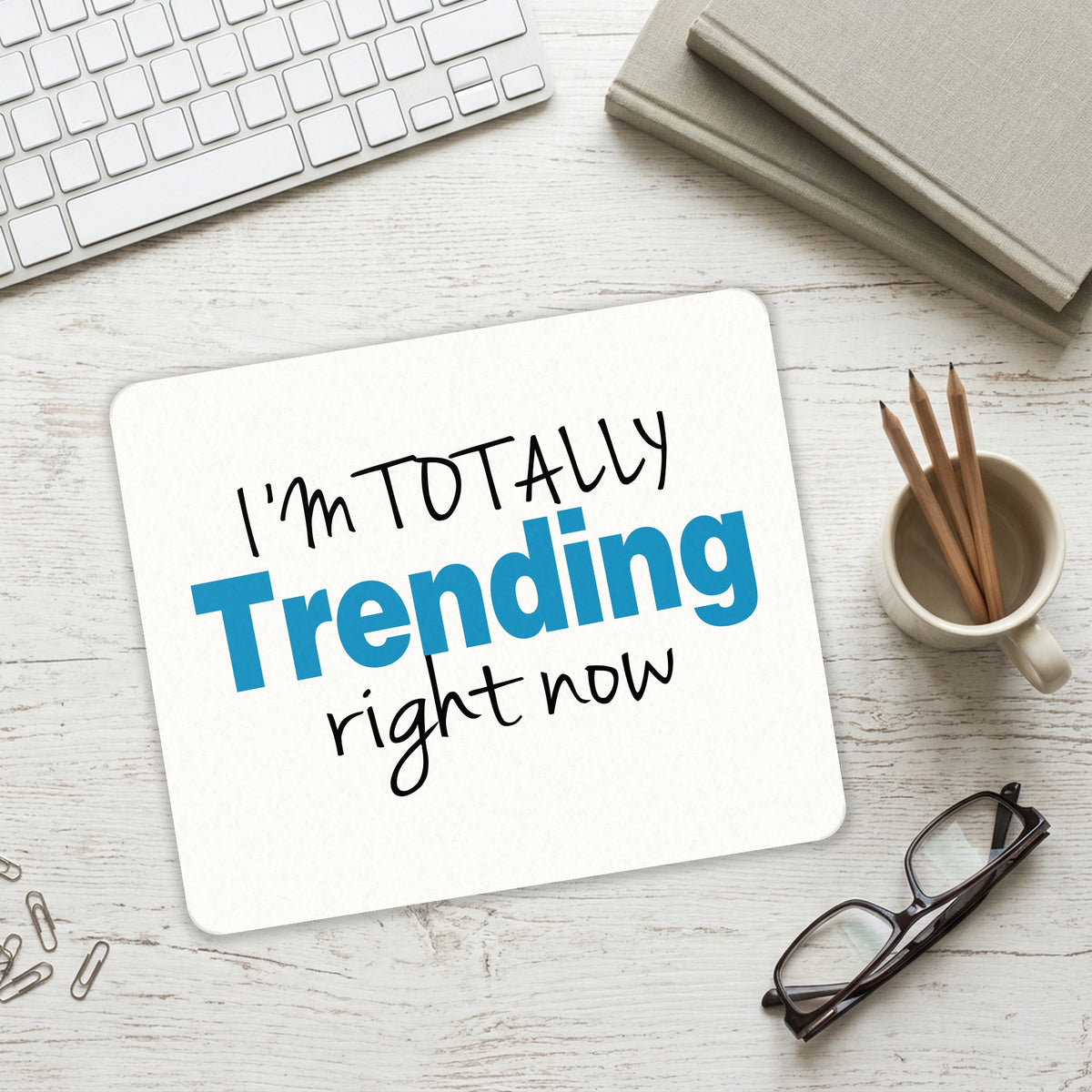 I'm Totally Trending Right Now mouse pad on a desk with a keyboard