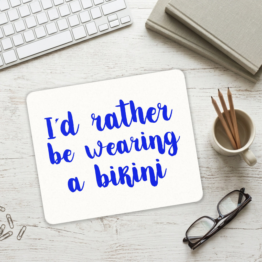 I'd Rather Be Wearing a Bikini mouse pad on a desk with a keyboard