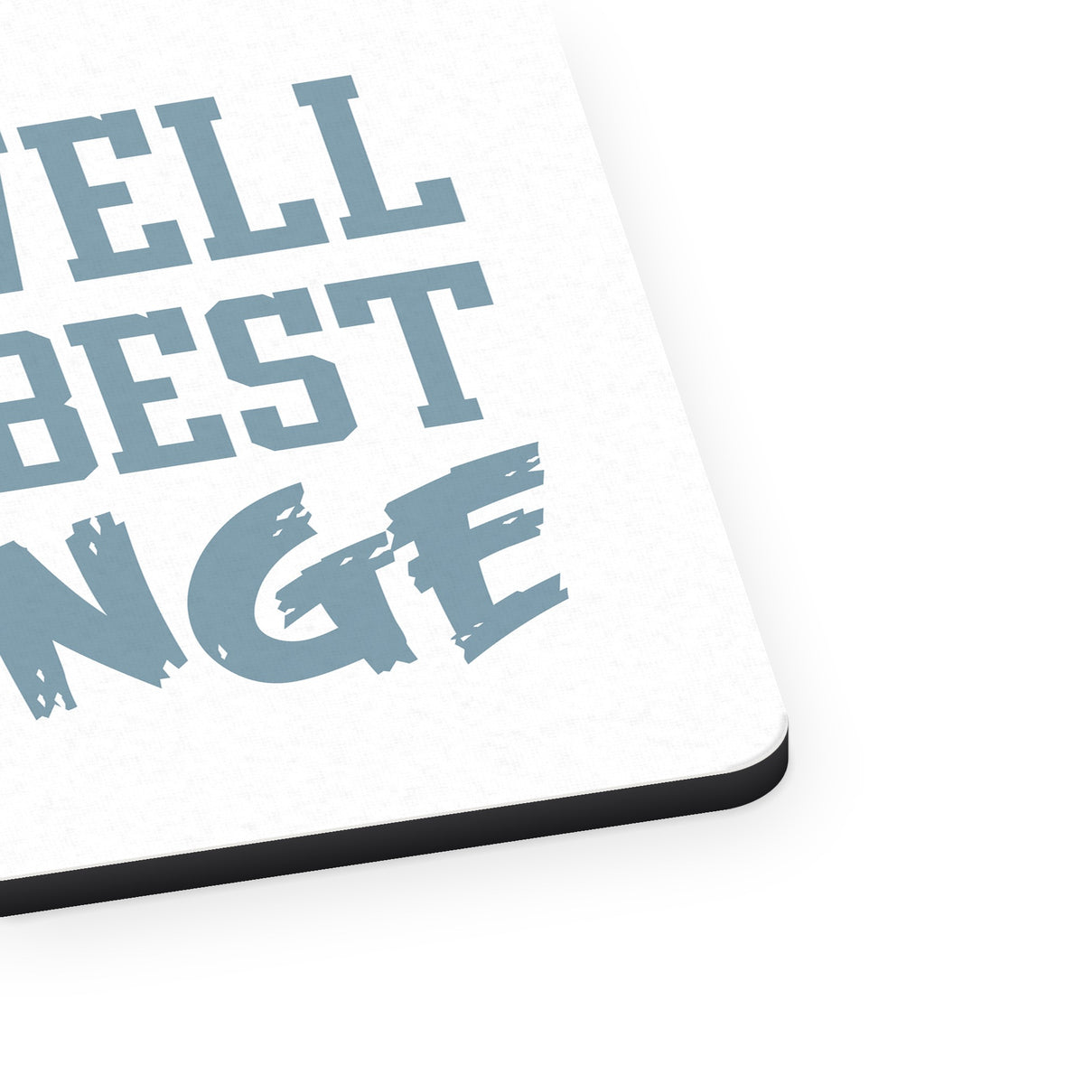 Living Well is The Best Revenge mouse pad, close-up of the fabric surface and rubber edge