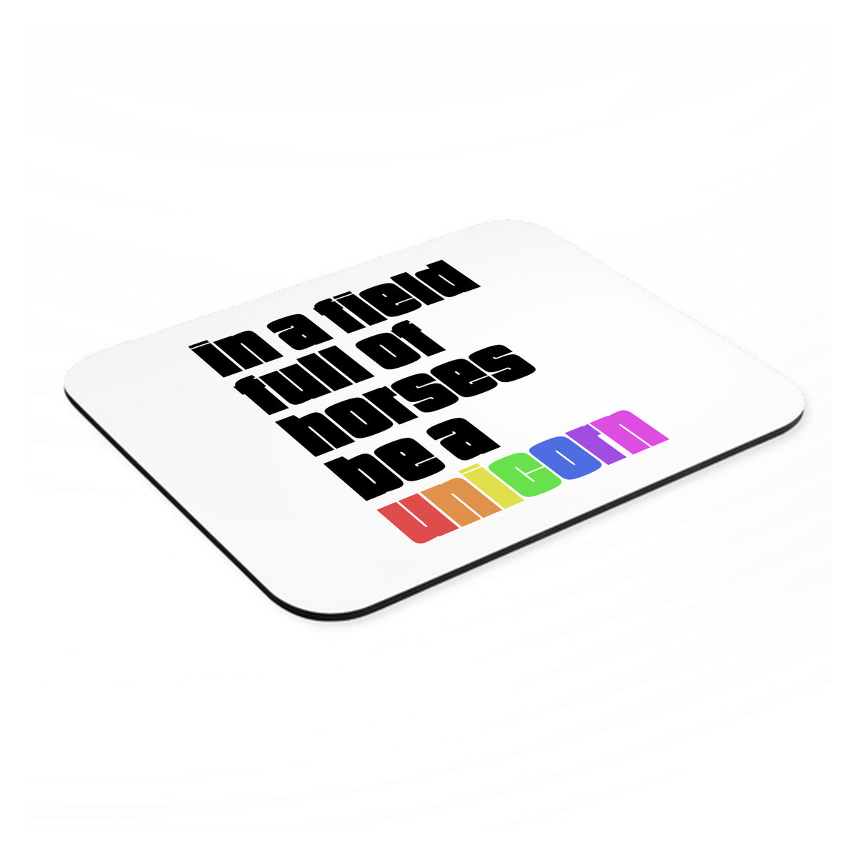In a Field Full of Horses Be a Unicorn mouse pad, angled view showing the 1/4 inch thick base