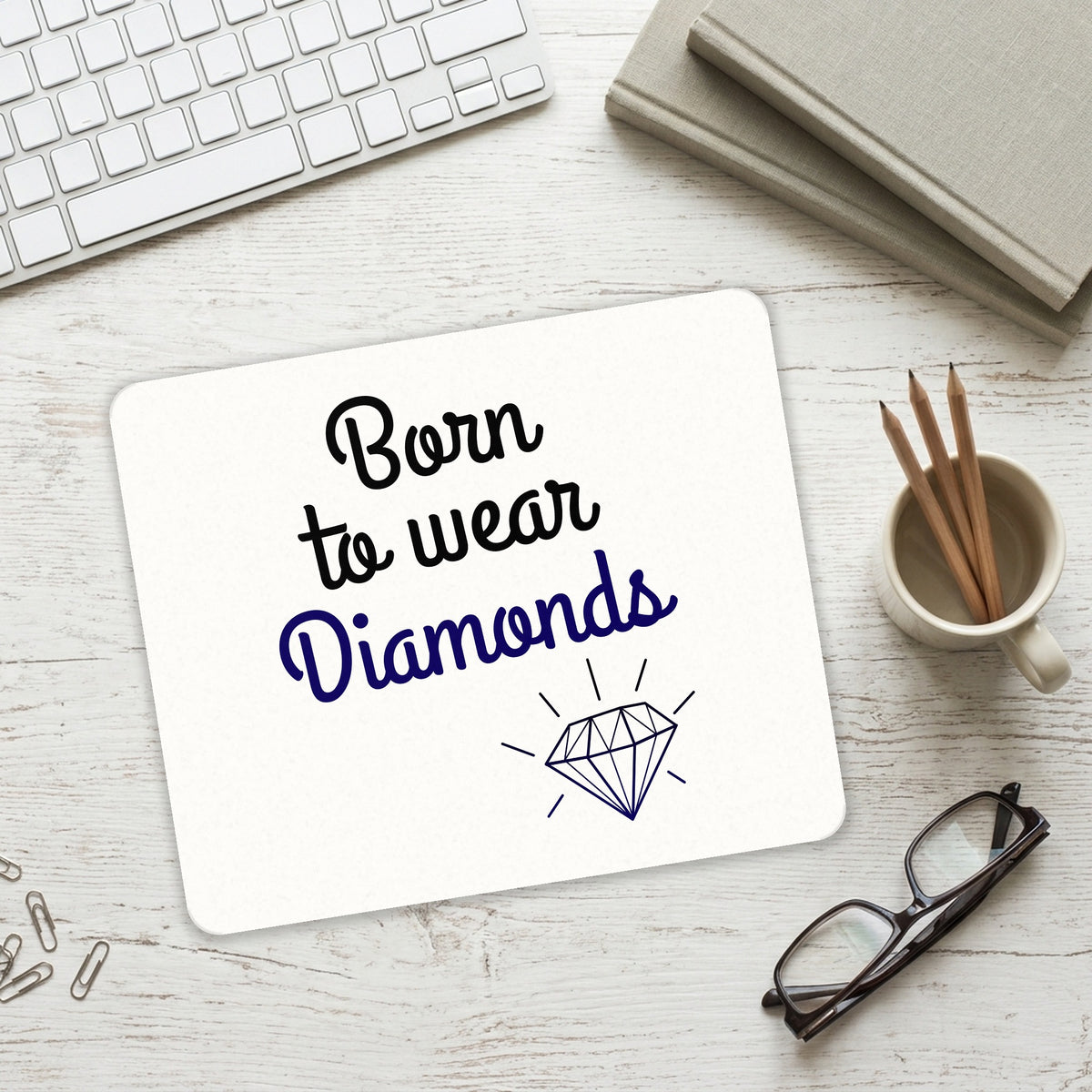 Born to Wear Diamonds mouse pad on a desk with a keyboard