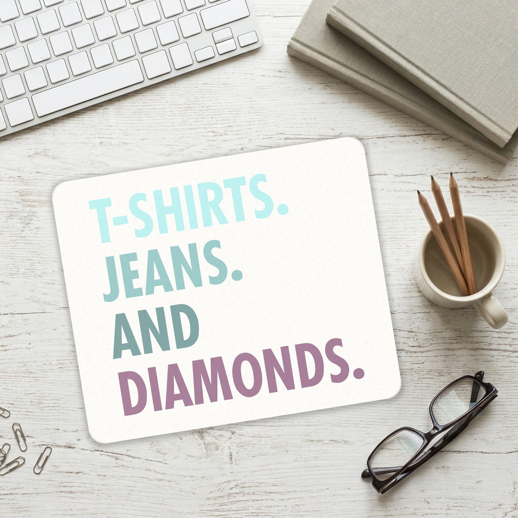 T-Shirts Jeans and Diamonds mouse pad on a desk with a keyboard