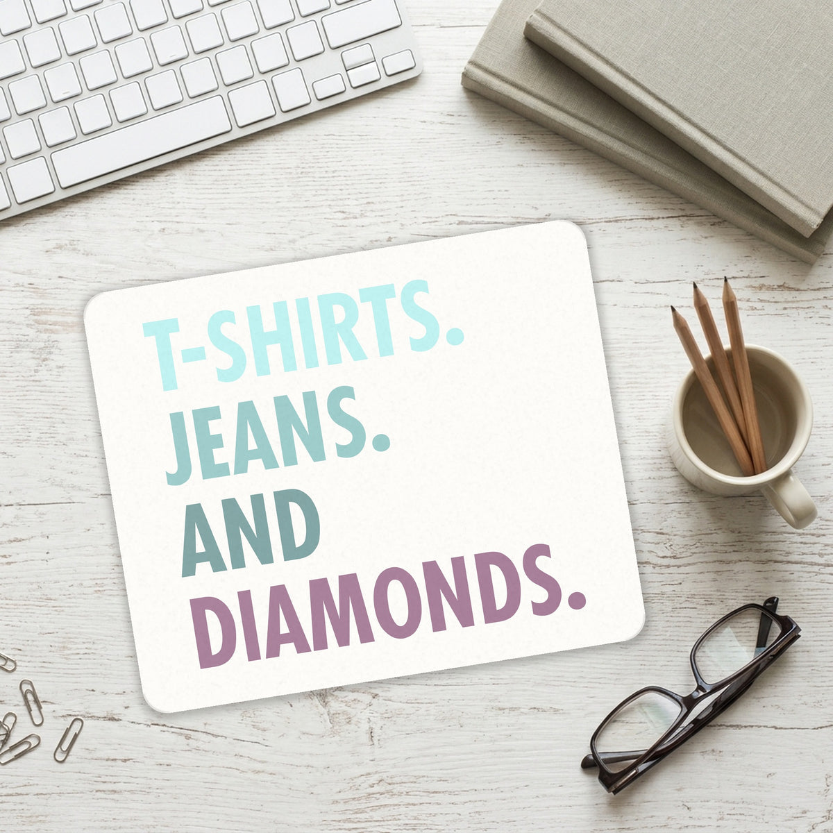 T-Shirts Jeans and Diamonds mouse pad on a desk with a keyboard