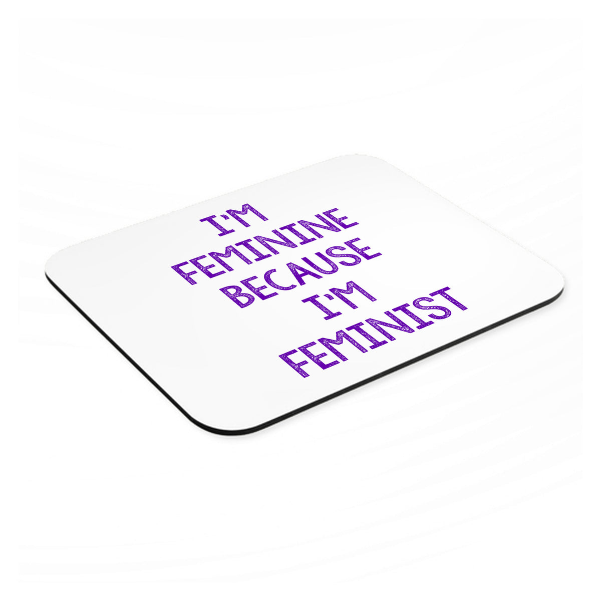 I'm Feminine Because I'm Feminist mouse pad, angled view showing the 1/4 inch thick base