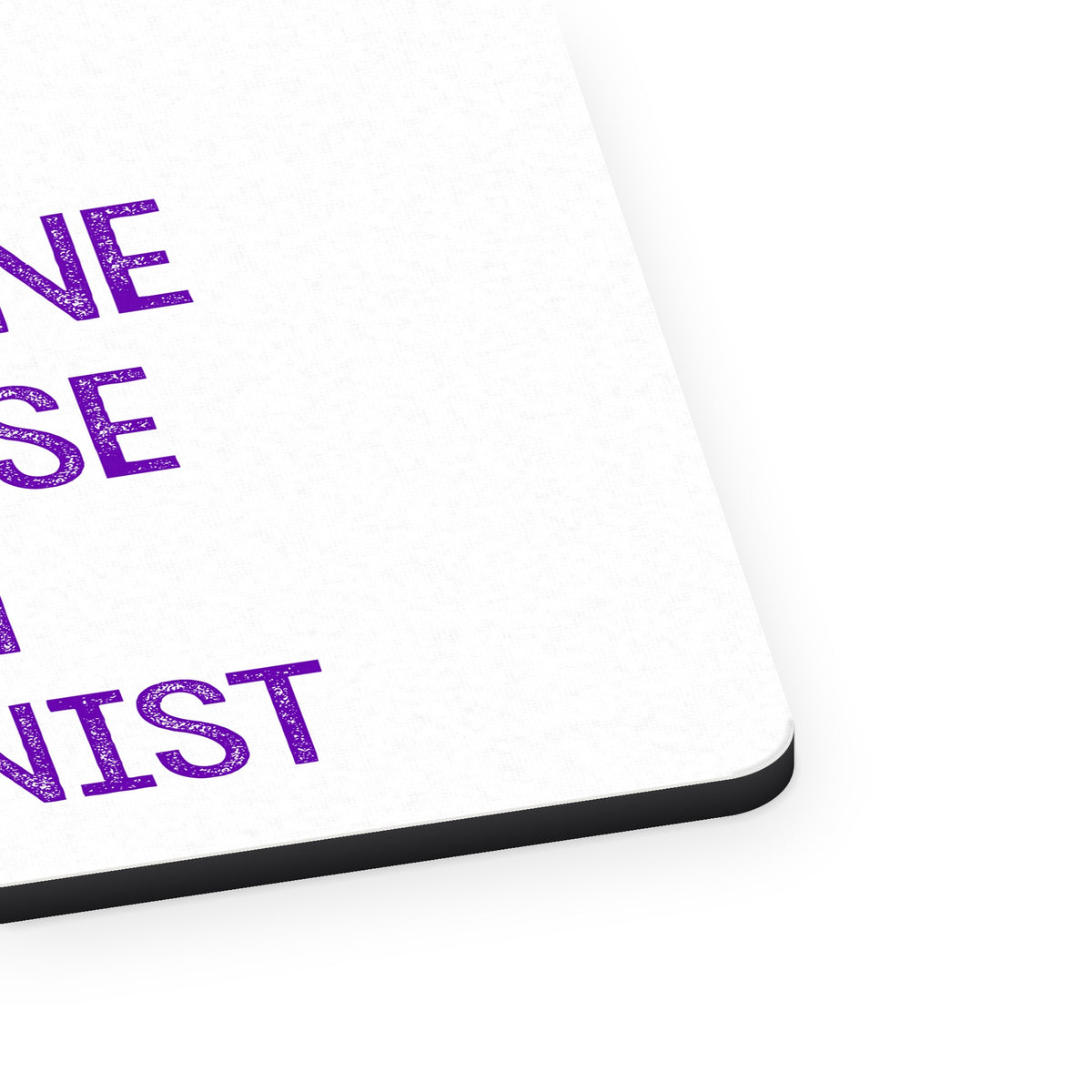 I'm Feminine Because I'm Feminist mouse pad, close-up of the fabric surface and rubber edge