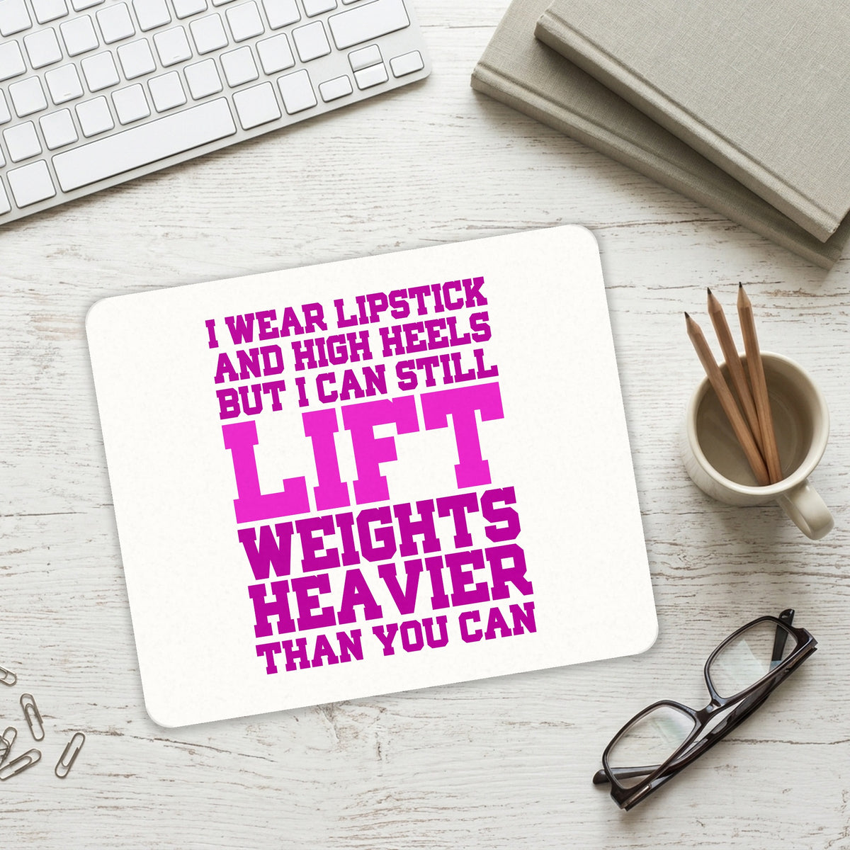 Lipstick & High Heels Can Life Weights Heavier mouse pad on a desk with a keyboard
