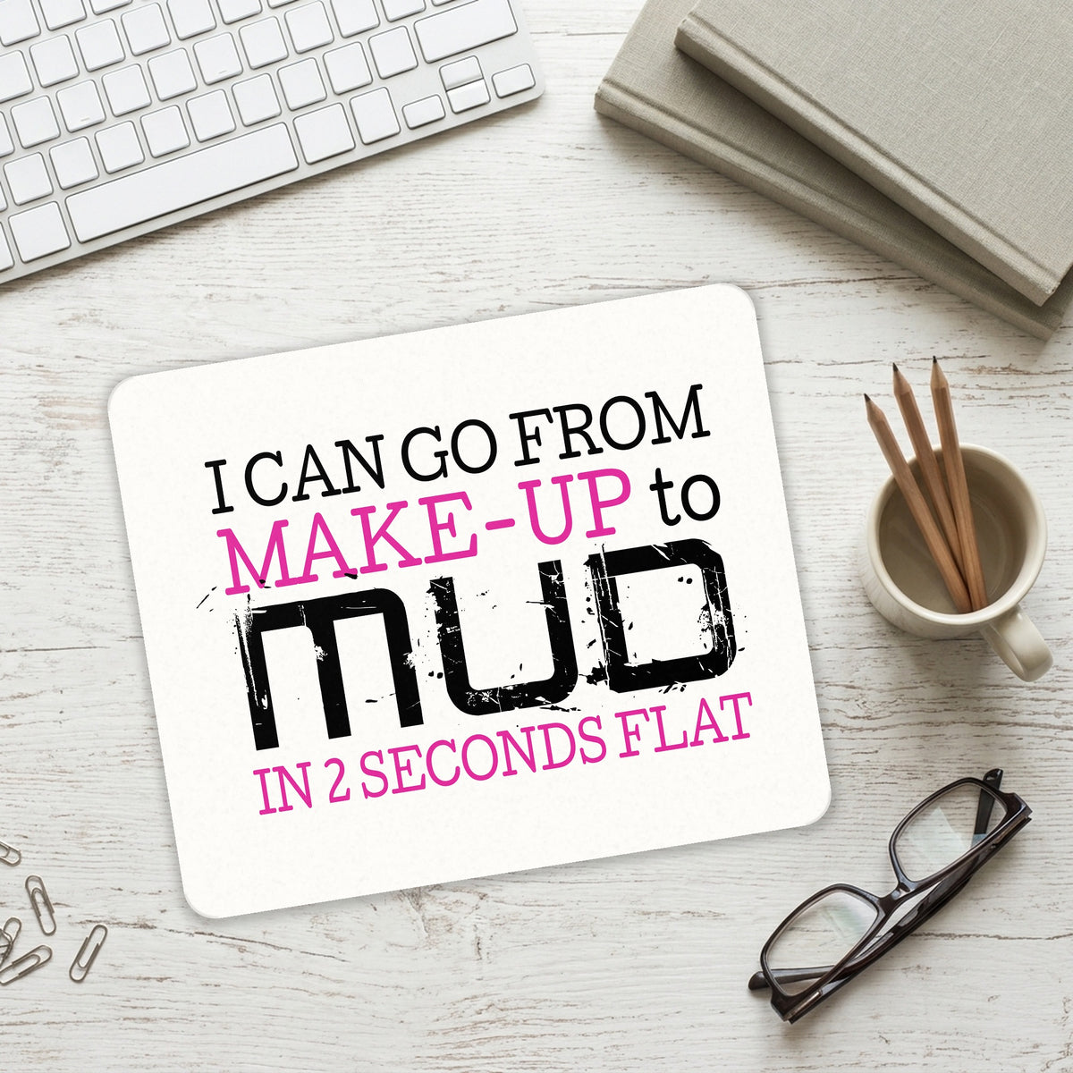 I Can Go From Make-Up to Mud in 2 Seconds mouse pad on a desk with a keyboard
