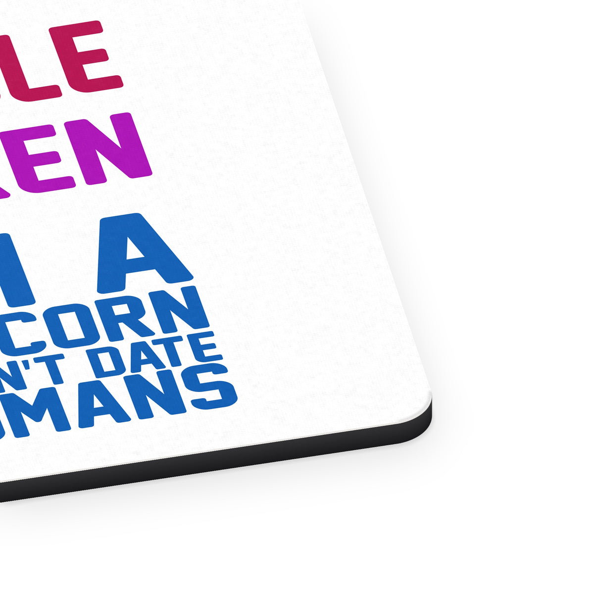 Single Taken I'm a Unicorn Don't Date Humans mouse pad, close-up of the fabric surface and rubber edge