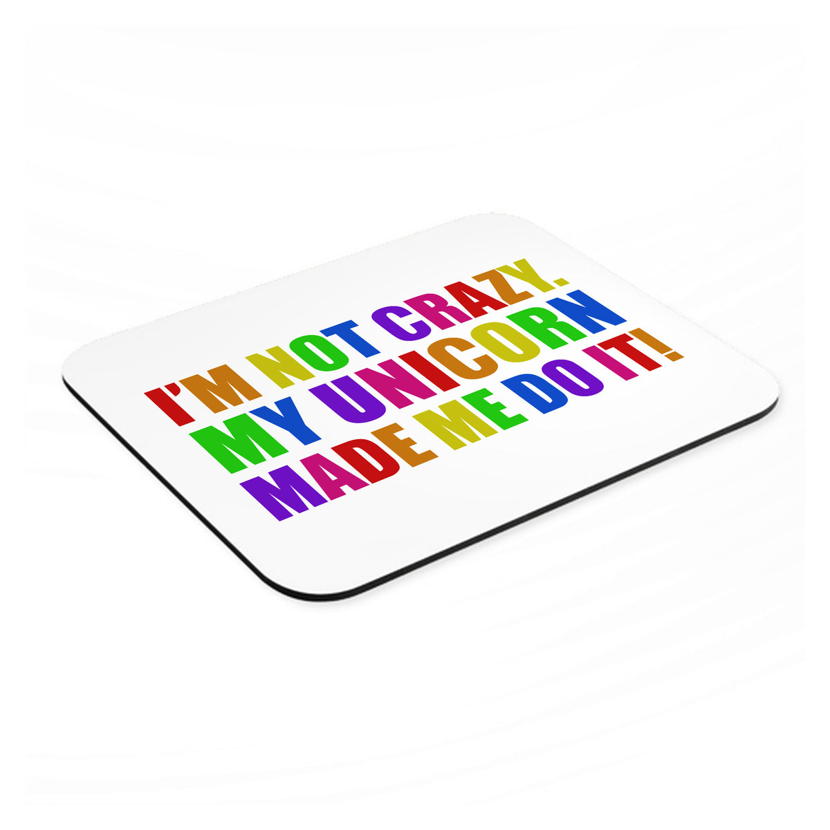 I'm Not Crazy My Unicorn Made Me Do It mouse pad, angled view showing the 1/4 inch thick base