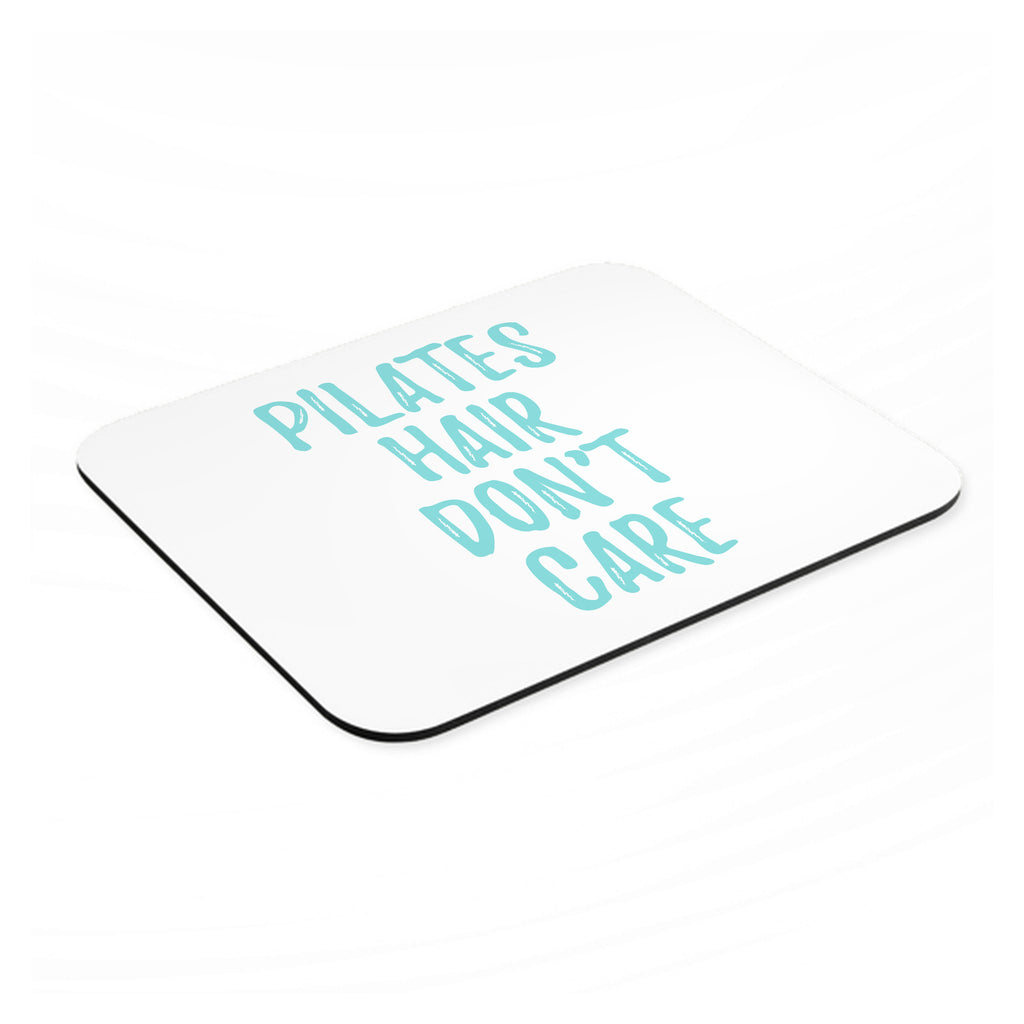 Pilates Hair Don't Care mouse pad, angled view showing the 1/4 inch thick base