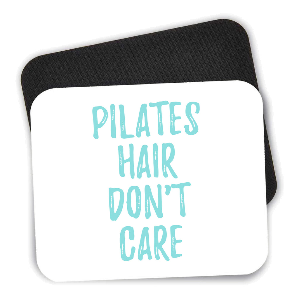Pilates Hair Don't Care mouse pad shown with its black non-slip rubber underside
