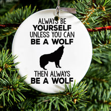 DistinctInk® Hanging Ceramic Christmas Tree Ornament with Gold String - Great Gift / Present - 2 3/4 inch Diameter - Always Be Yourself Unless You Can Be a Wolf