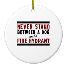 DistinctInk® Hanging Ceramic Christmas Tree Ornament with Gold String - Great Gift / Present - 2 3/4 inch Diameter - Never Stand Between Dog & Fire Hydrant