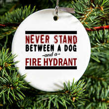 DistinctInk® Hanging Ceramic Christmas Tree Ornament with Gold String - Great Gift / Present - 2 3/4 inch Diameter - Never Stand Between Dog & Fire Hydrant