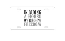 DistinctInk Custom Aluminum Decorative Vanity Front License Plate - In Riding a Horse, We Borrow Freedom
