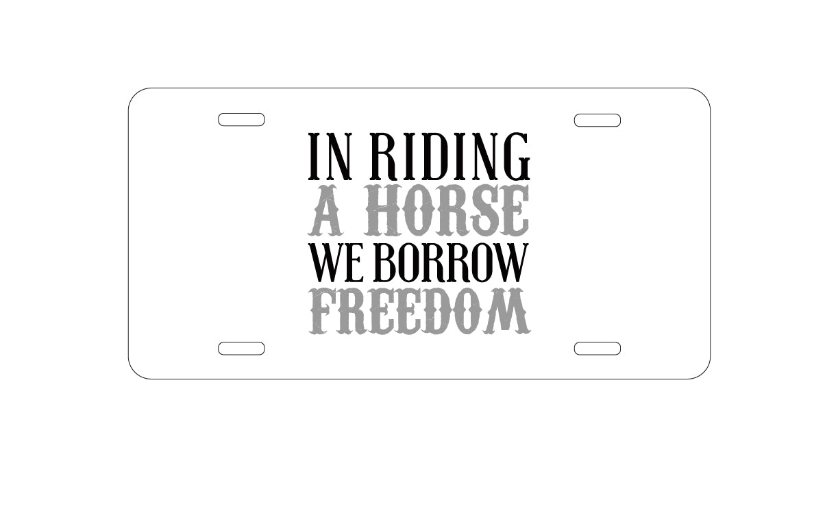 DistinctInk Custom Aluminum Decorative Vanity Front License Plate - In Riding a Horse, We Borrow Freedom