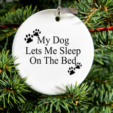 DistinctInk® Hanging Ceramic Christmas Tree Ornament with Gold String - Great Gift / Present - 2 3/4 inch Diameter - My Dog Lets Me Sleep On The Bed