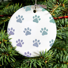 DistinctInk® Hanging Ceramic Christmas Tree Ornament with Gold String - Great Gift / Present - 2 3/4 inch Diameter - Gradient Pawprints - Purple to Green